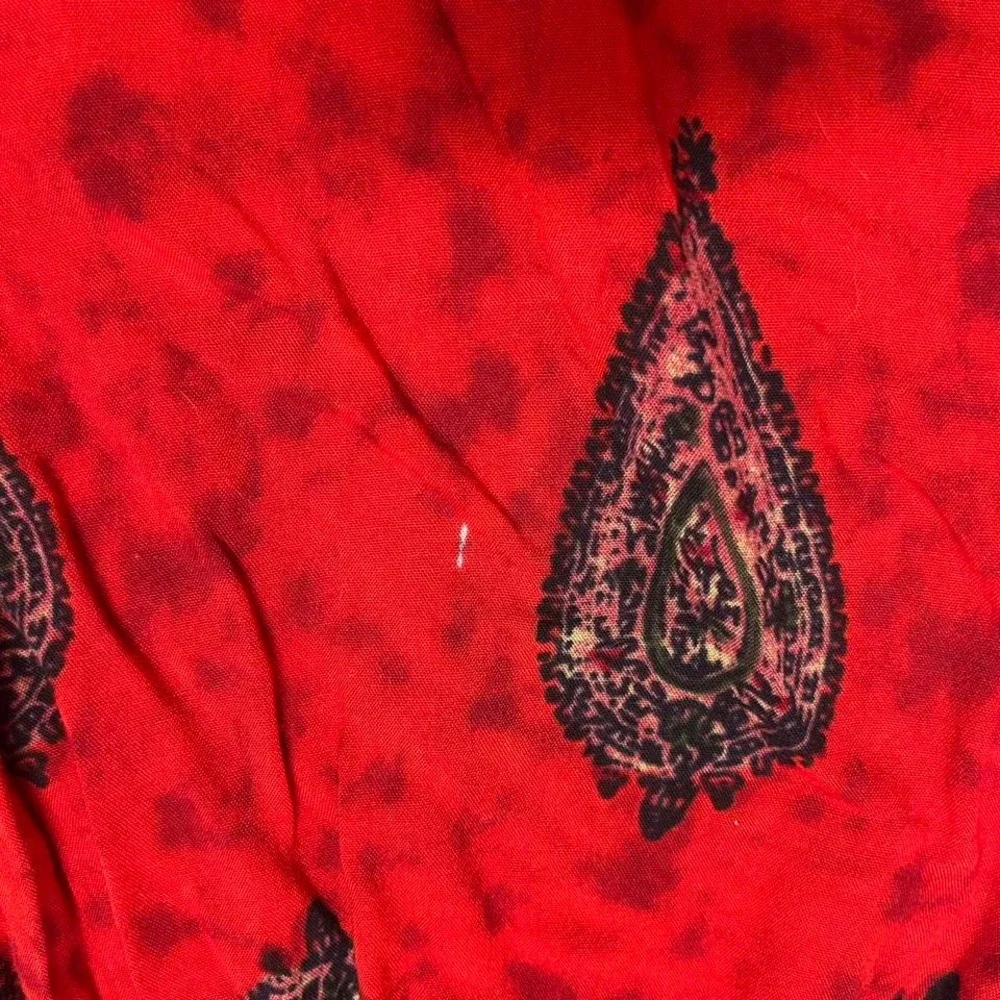 Y2K Rave Red and black paisley print flare pants‎